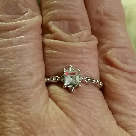 Jewelry - SparklingCz emerald cut ring - 7.5